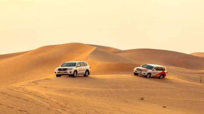 Desert Sunrise Safari in Abu Dhabi: Dune Bashing, Sand Boarding, Camel Ride - Main Image