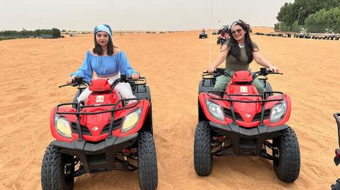 Red Dunes Safari Dubai Quad Bike Camel Ride Sandboard &BBQ Dinner Day Tours - Main Image