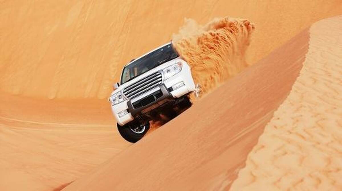 Arabian Night Safari with Camel Ride, Sandboard, BBQ & Live Shows Day Tours - Main Image
