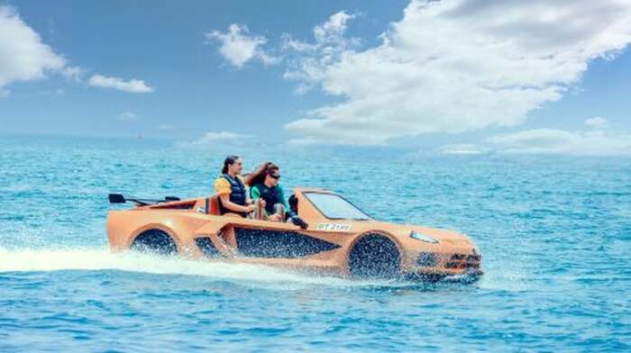 Dubai yacht water activities including optional jet ski, surfboard, sea car, wake surfing, and water paragliding - Main Image